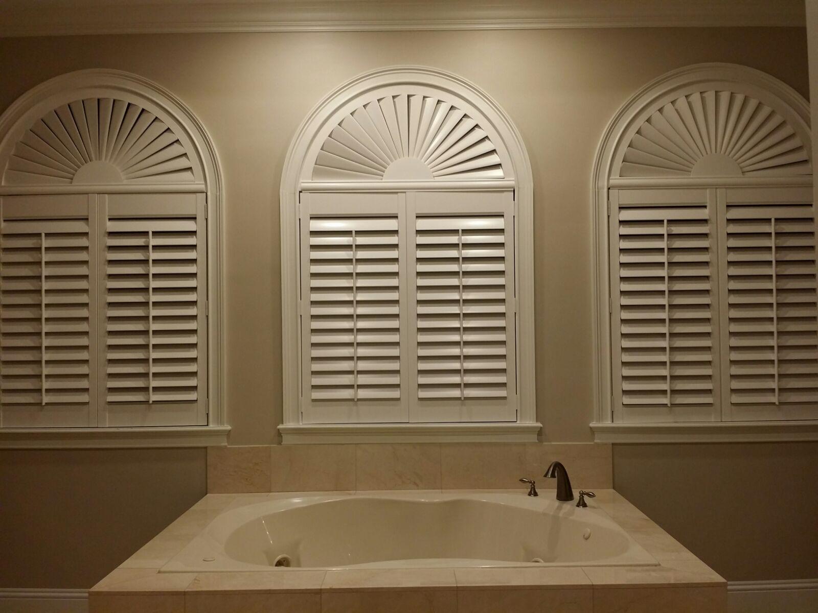 Custom shutters fitted to arched windows